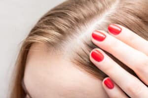 Woman enjoying healthy hair growth after alopecia treatment in Washington, DC