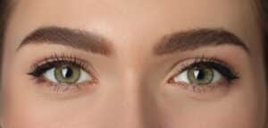 Woman with thick eyebrows after Neograft treatment in Washington DC