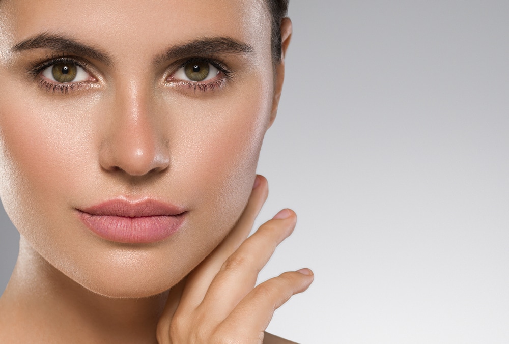 Woman with thick eyebrows after NeoGraft Eyebrow Restoration in Washington, DC